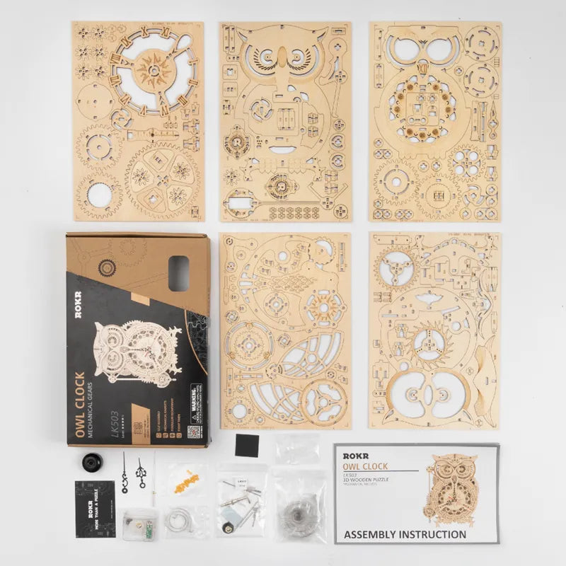 Wooden puzzle kit with assembly instructions and packaging on a white background